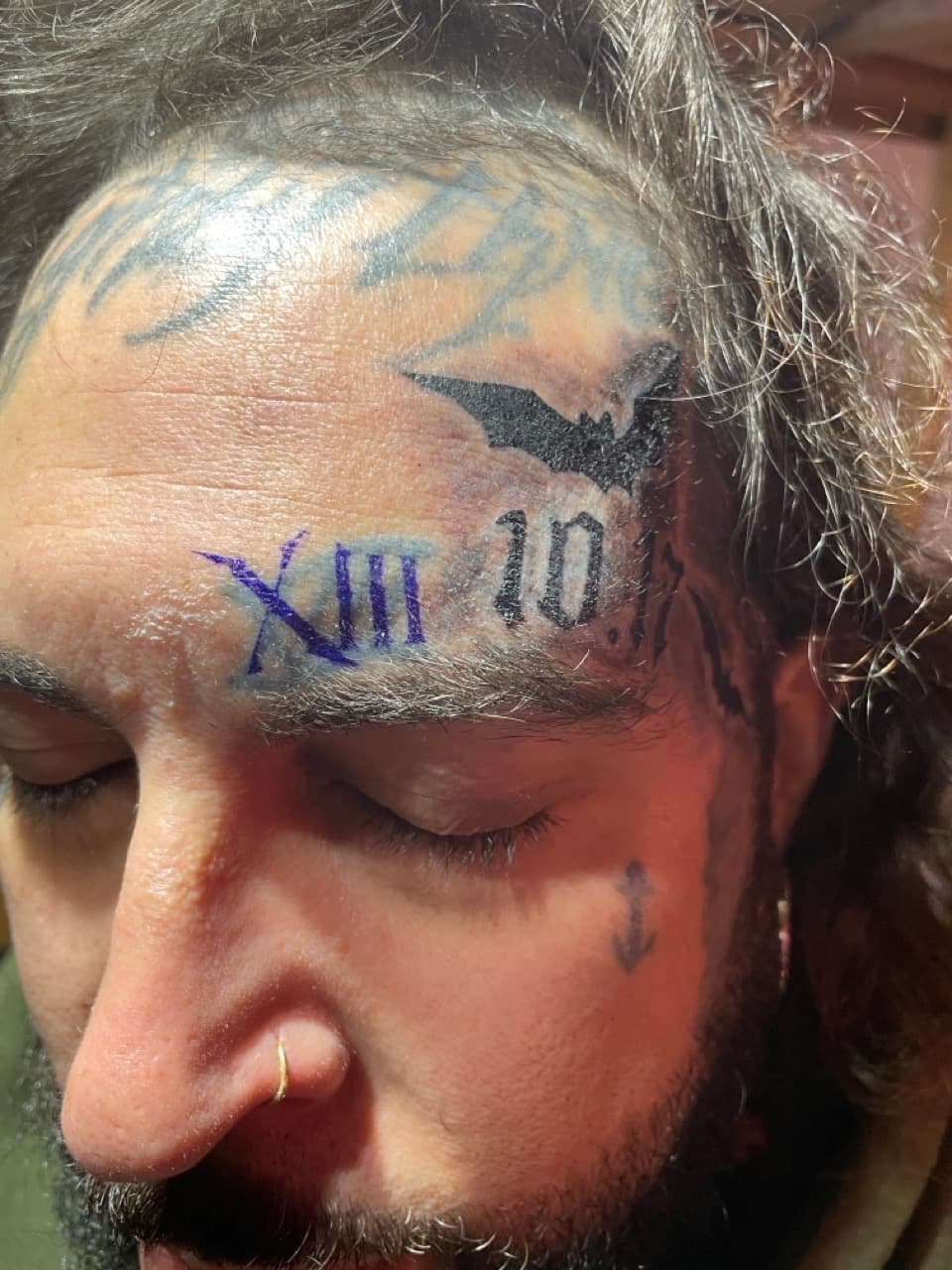 Lettering + Black-work bat tattoo on Forehead by Pain_Ink on TattMe