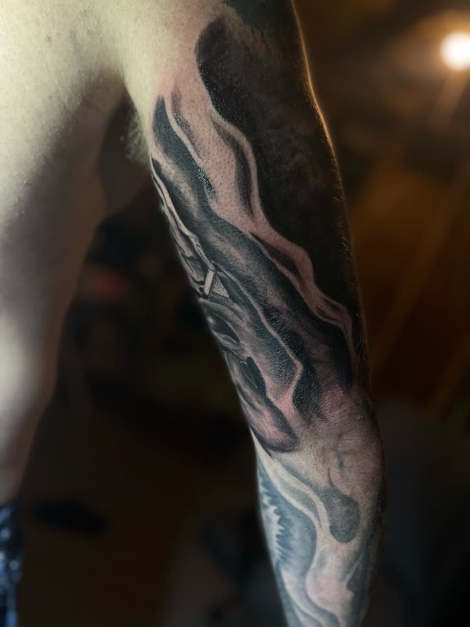 Black & Grey + Abstract smoke tattoo on Upper Arm by Pain_Ink on TattMe