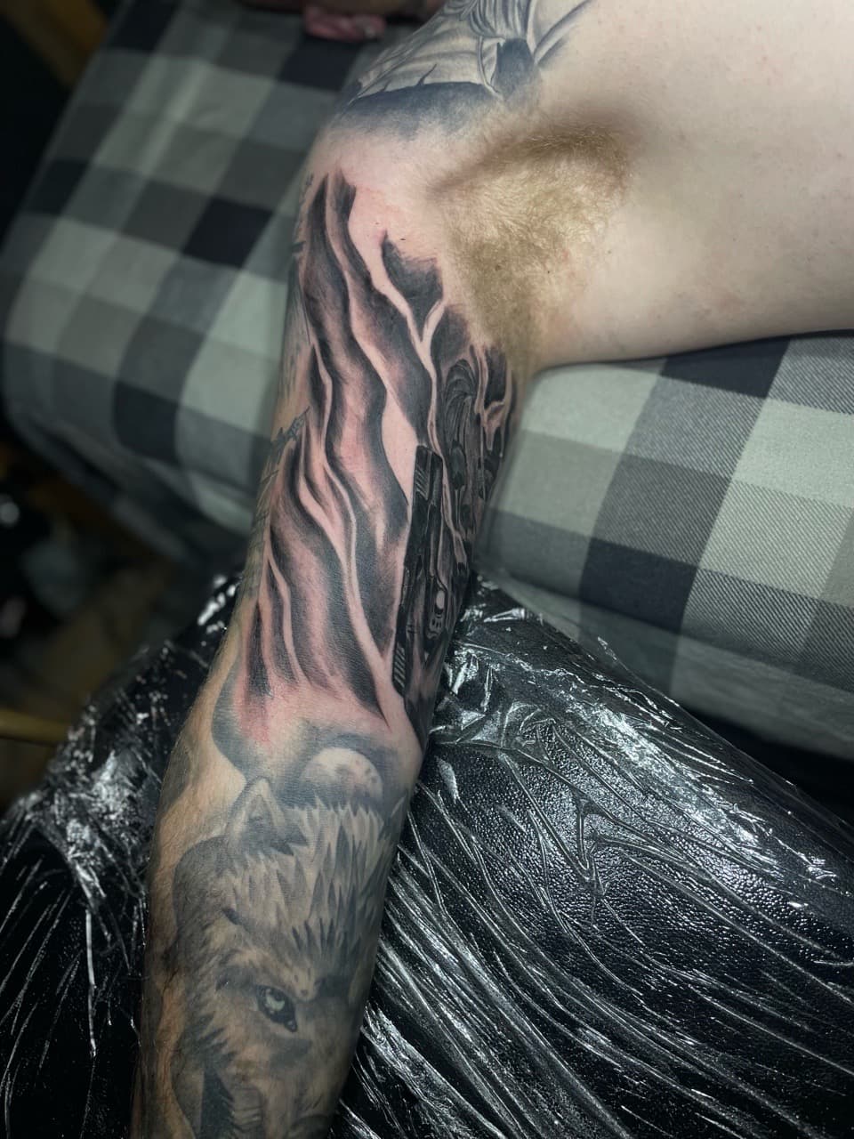 Black & Grey + Realism wolf tattoo on Upper Arm by Pain_Ink on TattMe