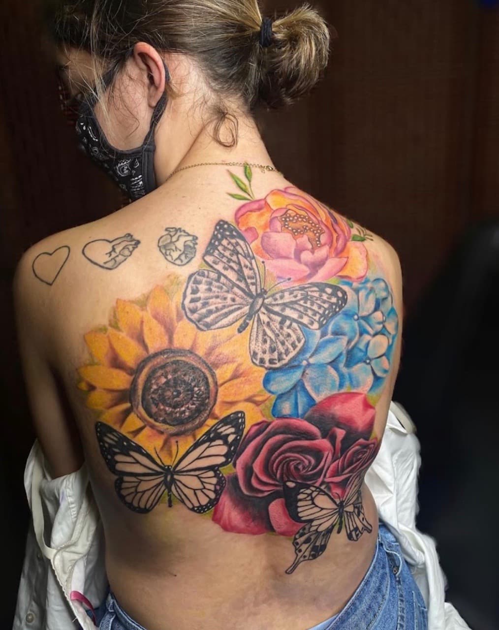 Color + Floral butterflies tattoo on Upper Back by GREATE_Ink_tattoo_parlor on TattMe