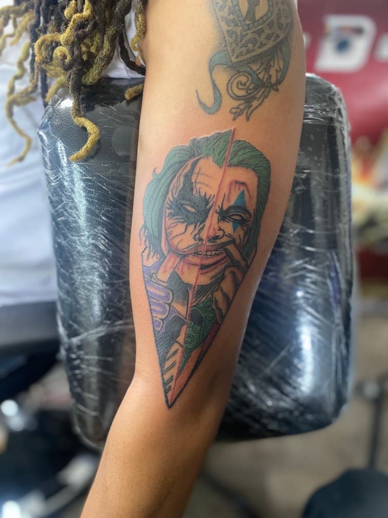 Pop Culture + Color joker tattoo on Upper Arm by Pablo_Bradley on TattMe