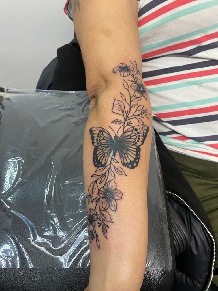 Fine Line + Black-work butterfly tattoo on Upper Arm by Pablo_Bradley on TattMe