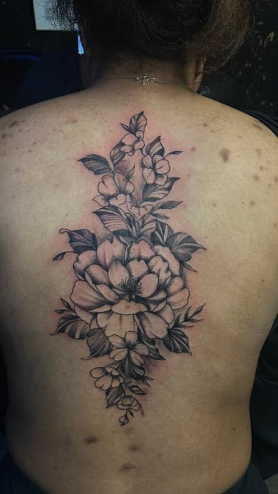 Floral + Black & Grey flowers tattoo on Upper Back by Leway_Tattoos on TattMe