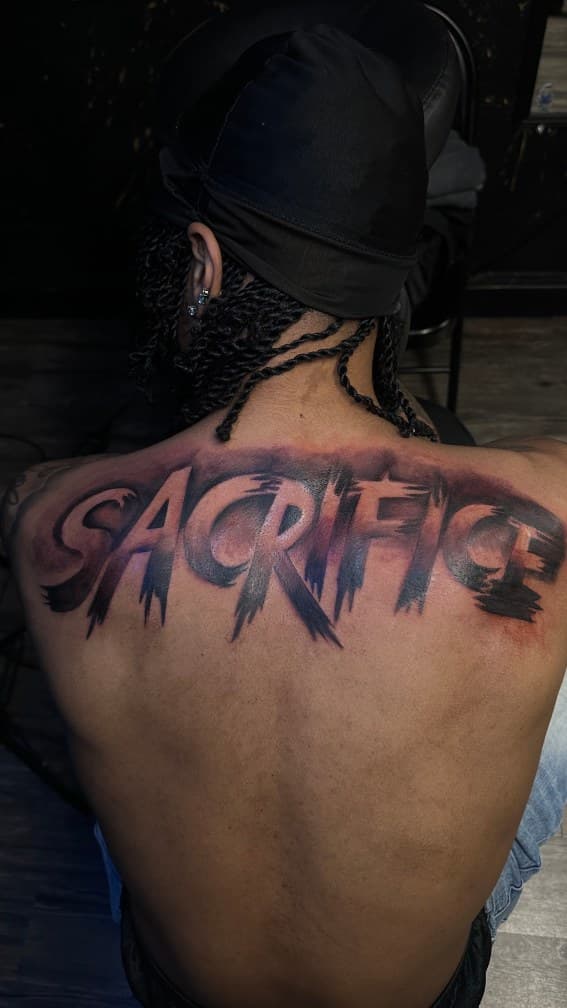 Lettering + Black-work sacrifice tattoo on Upper Back by Leway_Tattoos on TattMe