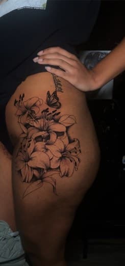 Fine Line + Black & Grey lilies tattoo on Thigh by Leway_Tattoos on TattMe