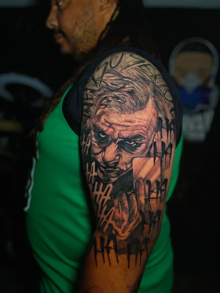 Realism + Black & Grey joker tattoo on Upper Arm by Leway_Tattoos on TattMe