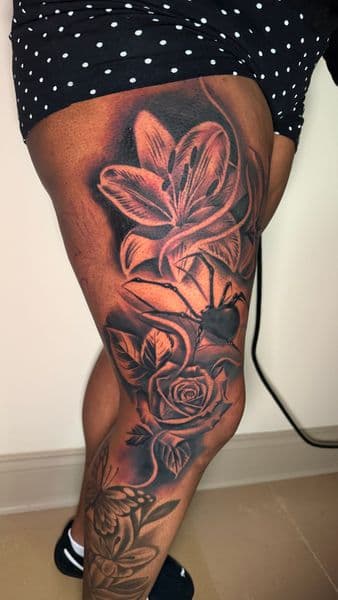 Black & Grey + Illustrative lily tattoo on Thigh by Kevin_Gray on TattMe