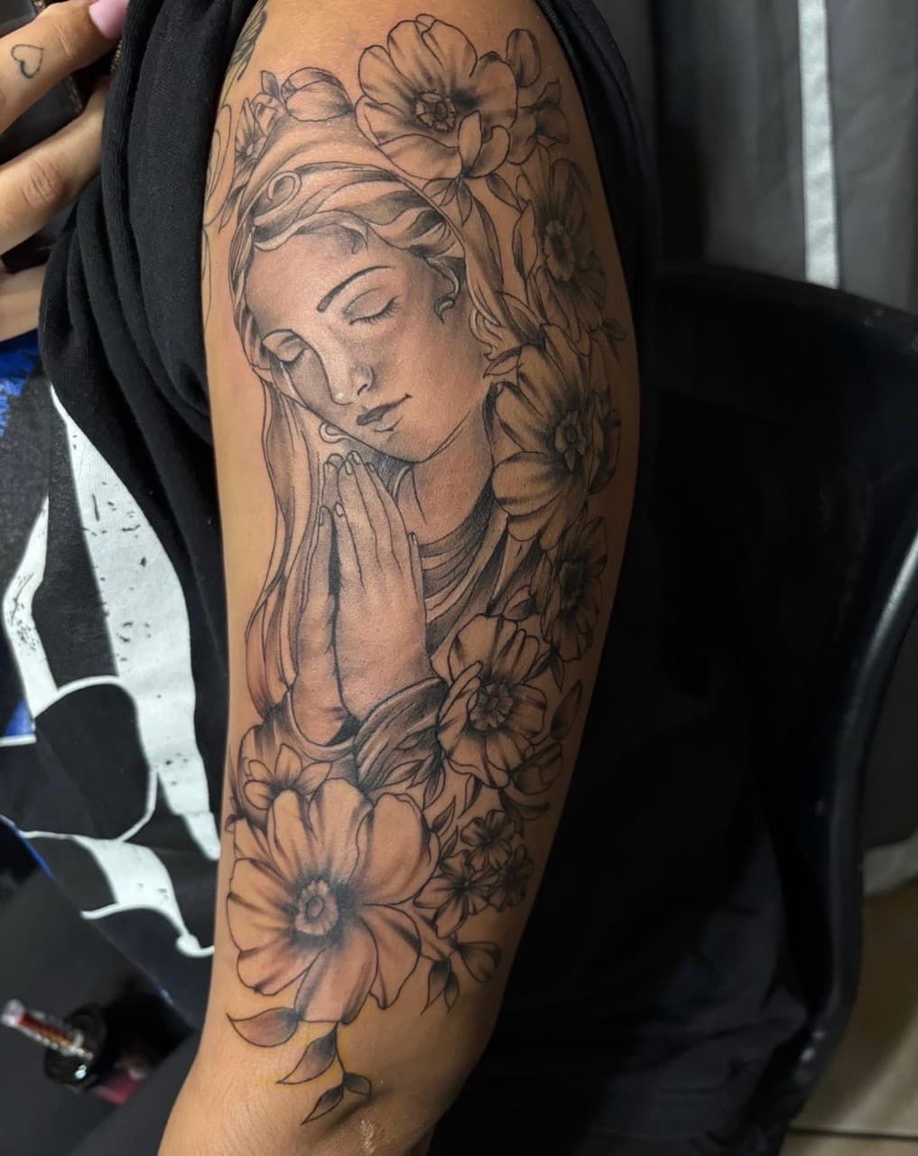 Black & Grey + Illustrative virgin mary tattoo on Upper Arm by Pretty_In_Ink on TattMe