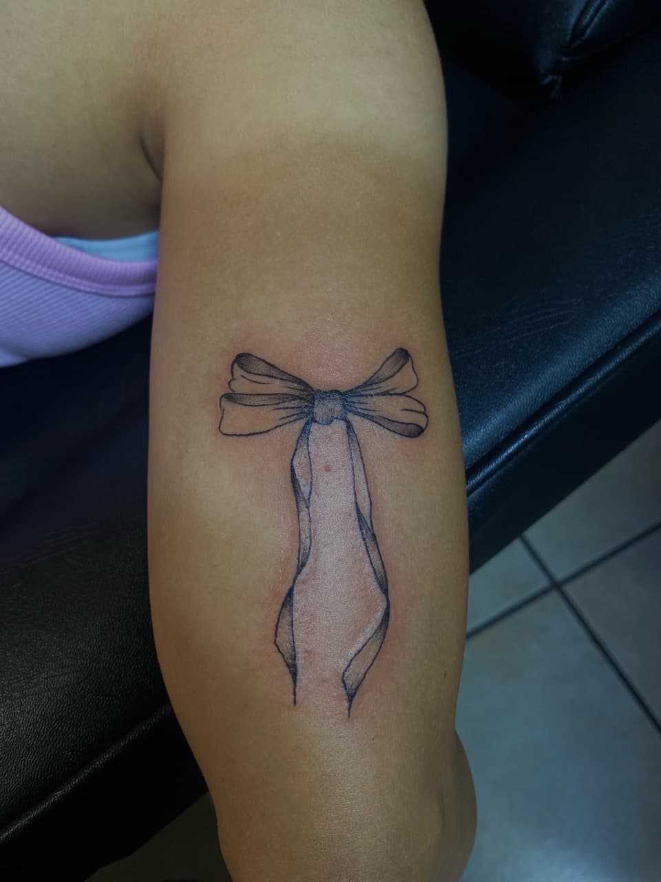 Fine Line + Black & Grey bow tattoo on Upper Arm by Pretty_In_Ink on TattMe