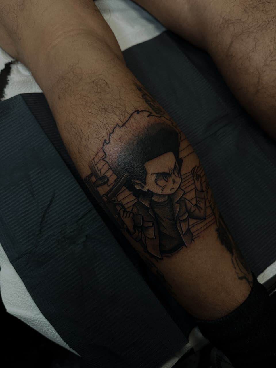 Cartoon + Illustrative huey freeman tattoo on Calf by Tattoos_by_Sinderella on TattMe