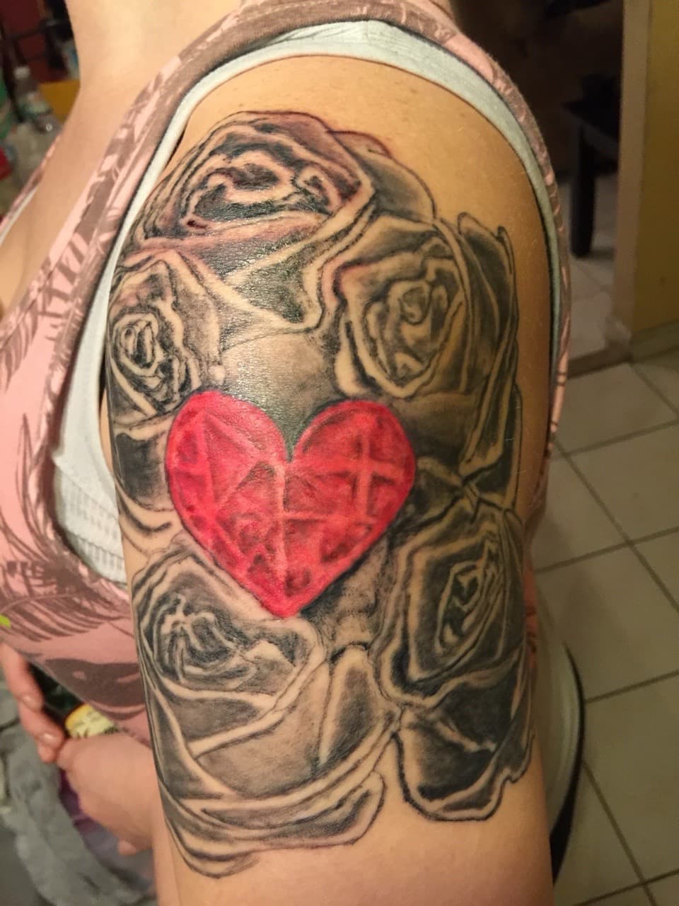 Black & Grey + Floral roses tattoo on Upper Arm by Tattsbygxd on TattMe