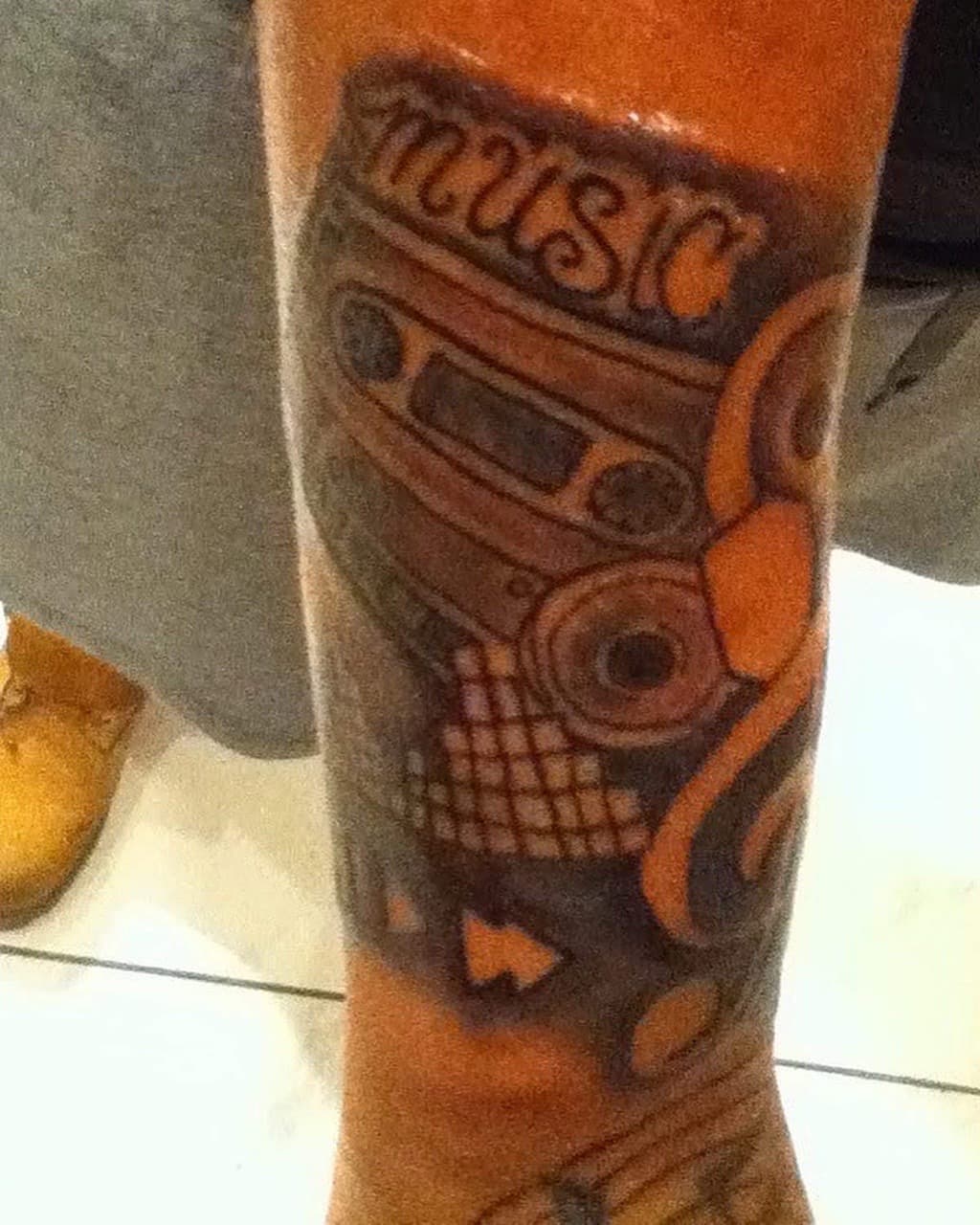 Black & Grey + Illustrative cassette tattoo on Calf by Tattsbygxd on TattMe