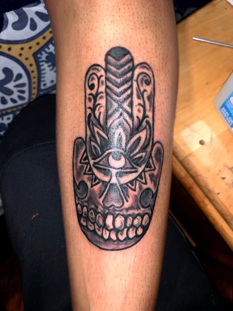 Black & Grey + Illustrative hamsa hand tattoo on Calf by Tattsbygxd on TattMe