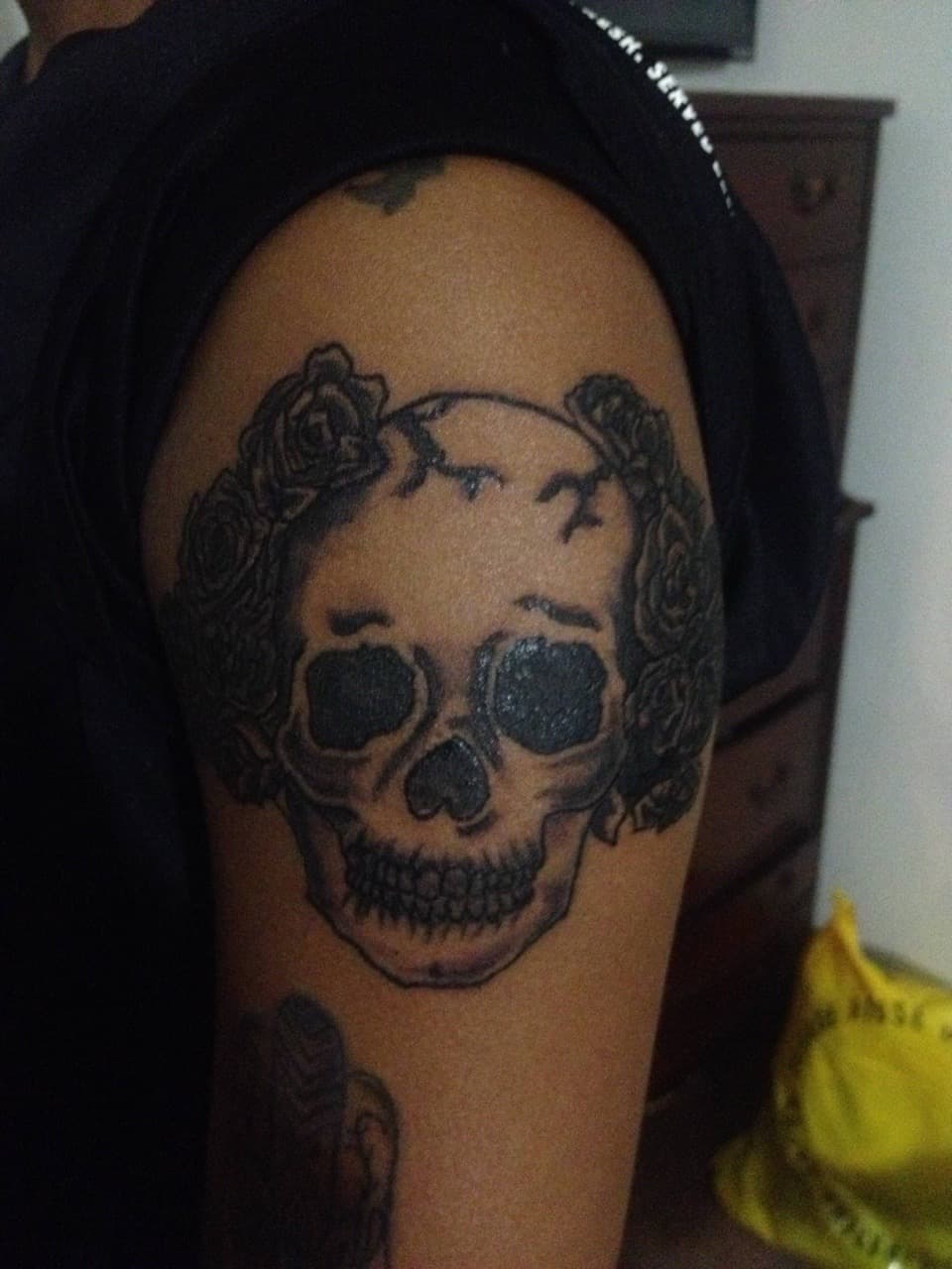 Black & Grey + Floral skull tattoo on Upper Arm by Tattsbygxd on TattMe