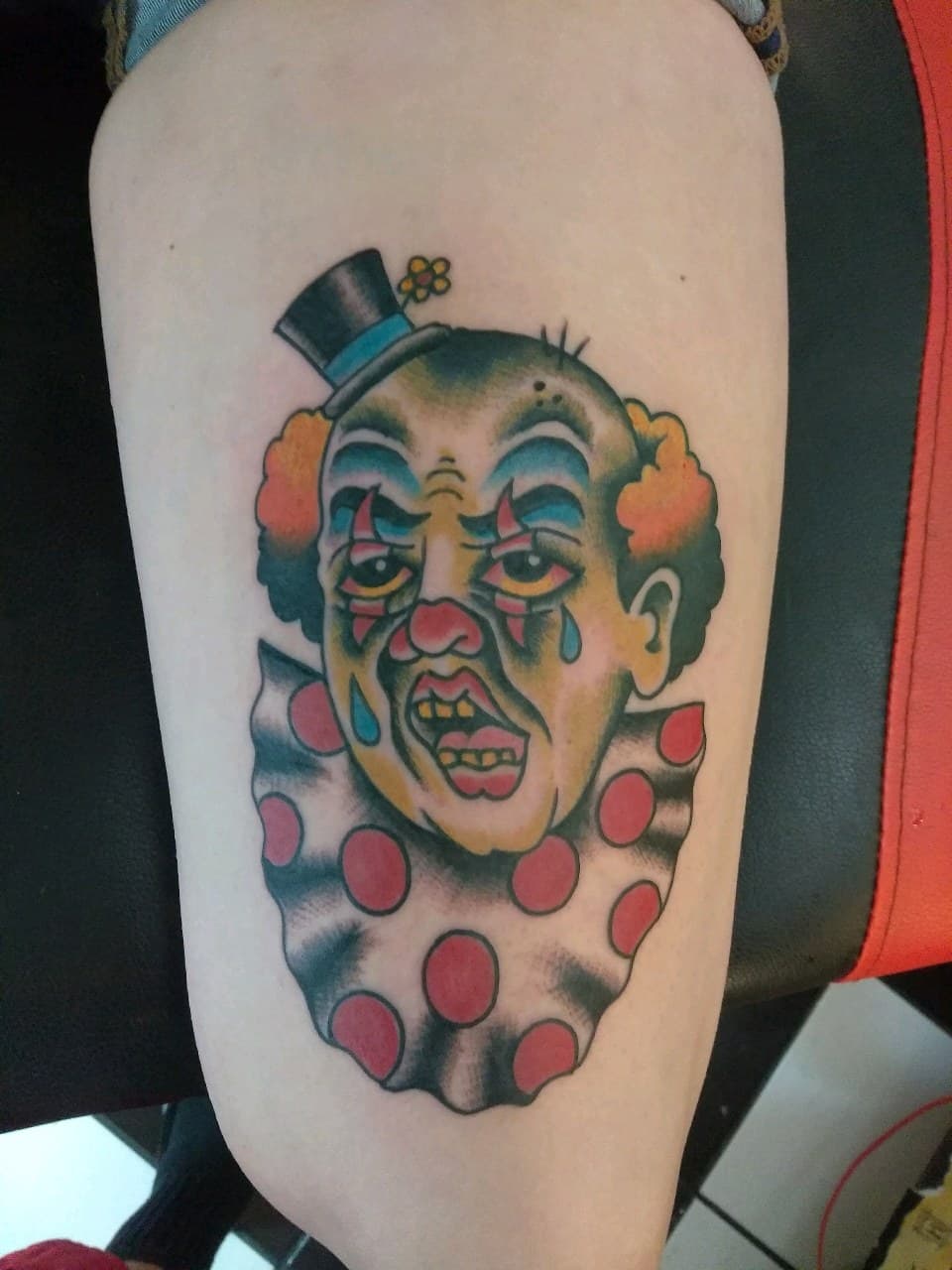 Traditional + American Traditional clown tattoo on Thigh by Altered_Image_Tattoo on TattMe