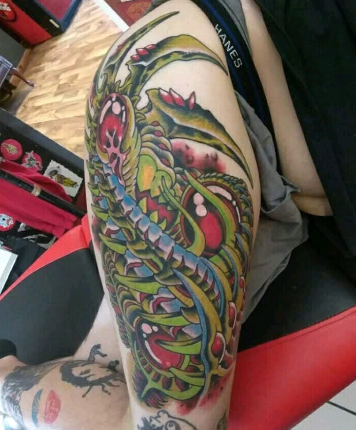 New School + Color creature tattoo on Thigh by Altered_Image_Tattoo on TattMe