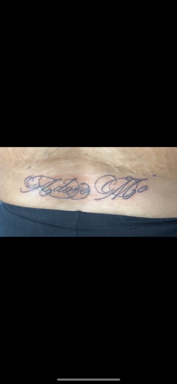 Lettering + Script words tattoo on Lower Back by inkedbyk on TattMe