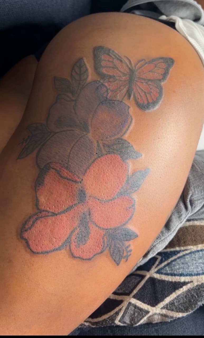 Floral + Color flowers tattoo on Thigh by inkedbyk on TattMe