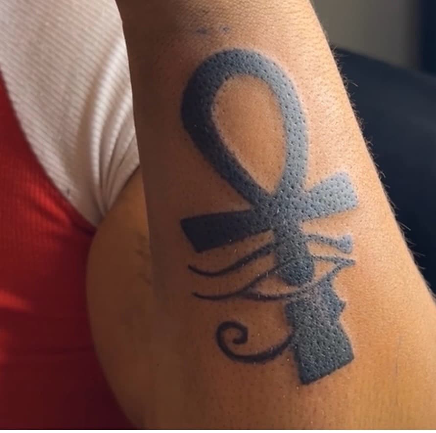 Black-work + Symbolic ankh tattoo on Upper Arm by inkedbyk on TattMe
