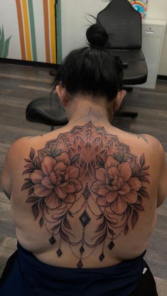Black & Grey + Floral flowers tattoo on Upper Back by Gifted_Body_Art on TattMe