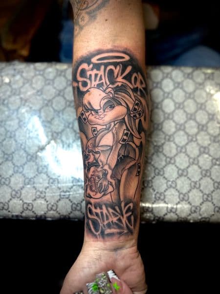 Black & Grey + Illustrative lola bunny tattoo on Forearm by Gifted_Body_Art on TattMe