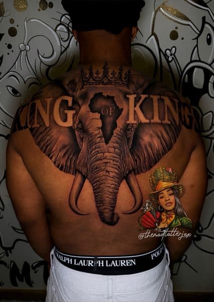 Realism + Black & Grey elephant tattoo on Upper Back by TheMadTatter on TattMe