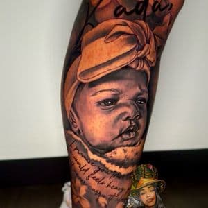Realism + Black & Grey baby tattoo on Calf by TheMadTatter on TattMe