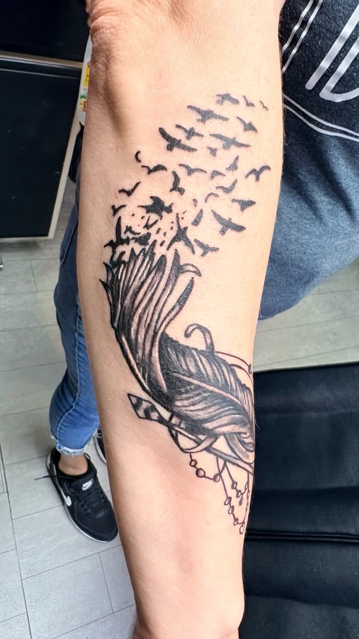 Black & Grey + Illustrative feather tattoo on Forearm by Taking_Art_2_The_Streets on TattMe
