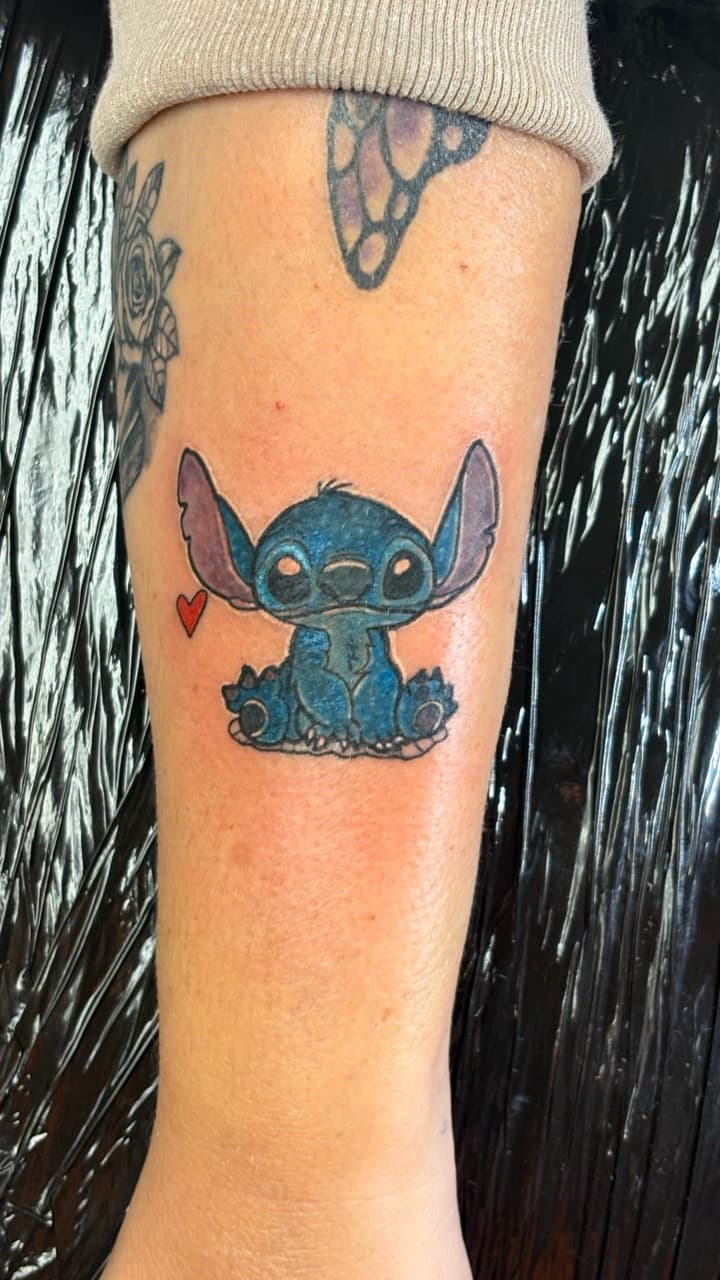 Cartoon + Pop Culture stitch tattoo on Forearm by Taking_Art_2_The_Streets on TattMe