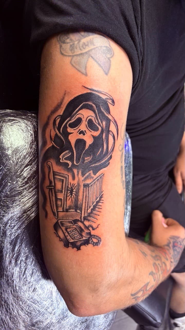 Black & Grey + Pop Culture ghostface tattoo on Upper Arm by Taking_Art_2_The_Streets on TattMe