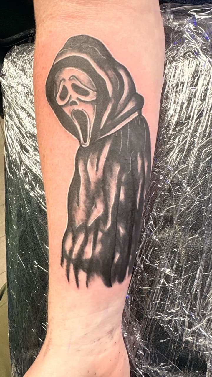 Black & Grey + Pop Culture ghostface tattoo on Forearm by Taking_Art_2_The_Streets on TattMe