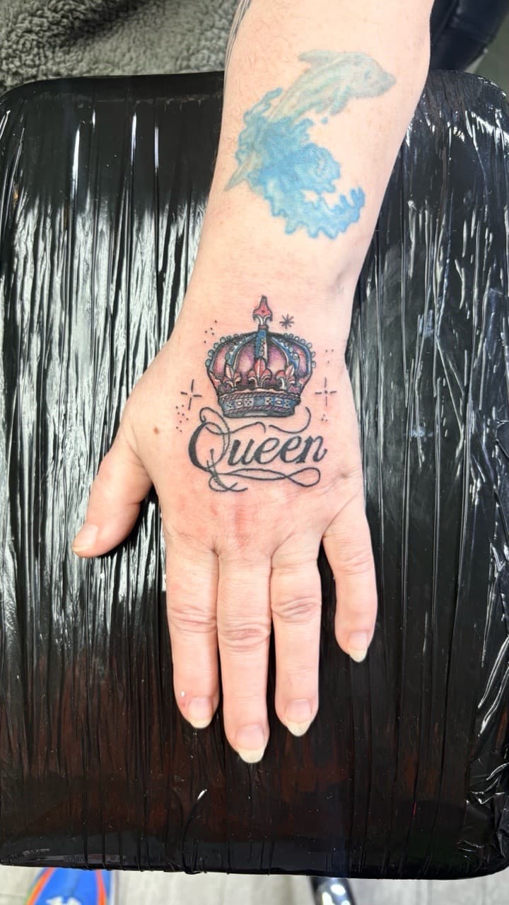 Lettering + Color crown tattoo on Hand by Taking_Art_2_The_Streets on TattMe