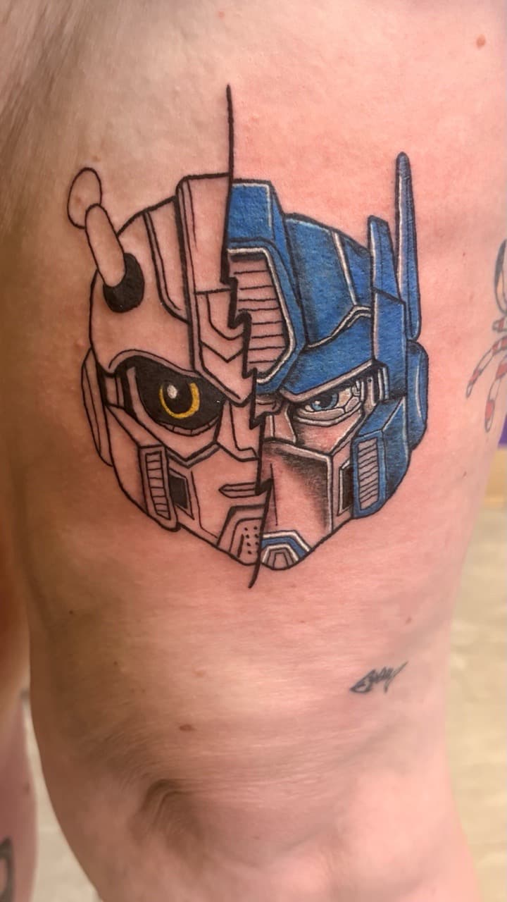 Pop Culture + Cartoon robots tattoo on Thigh by Taking_Art_2_The_Streets on TattMe