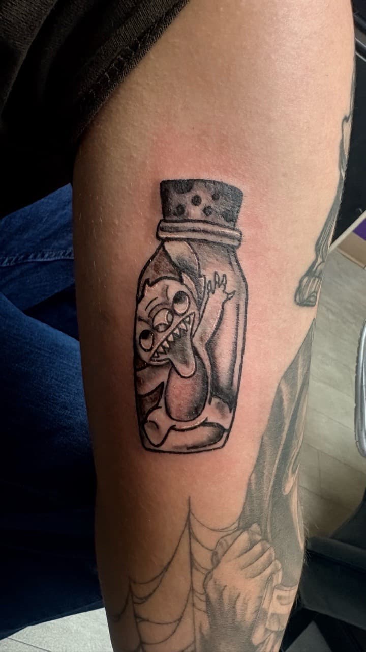 Black & Grey + Illustrative stitch tattoo on Upper Arm by Taking_Art_2_The_Streets on TattMe