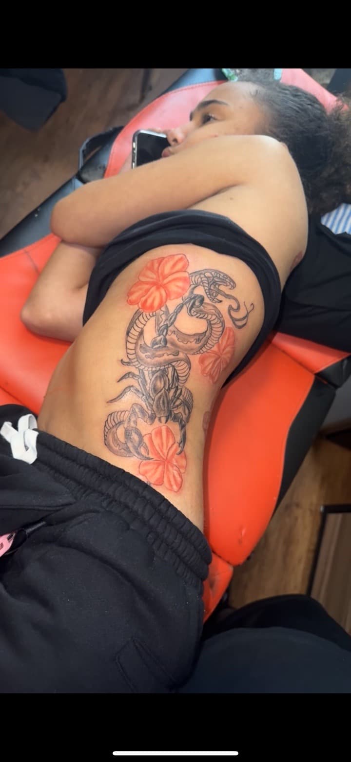 Black & Grey + Color scorpion tattoo on Ribs by grind2hardxtattoos on TattMe