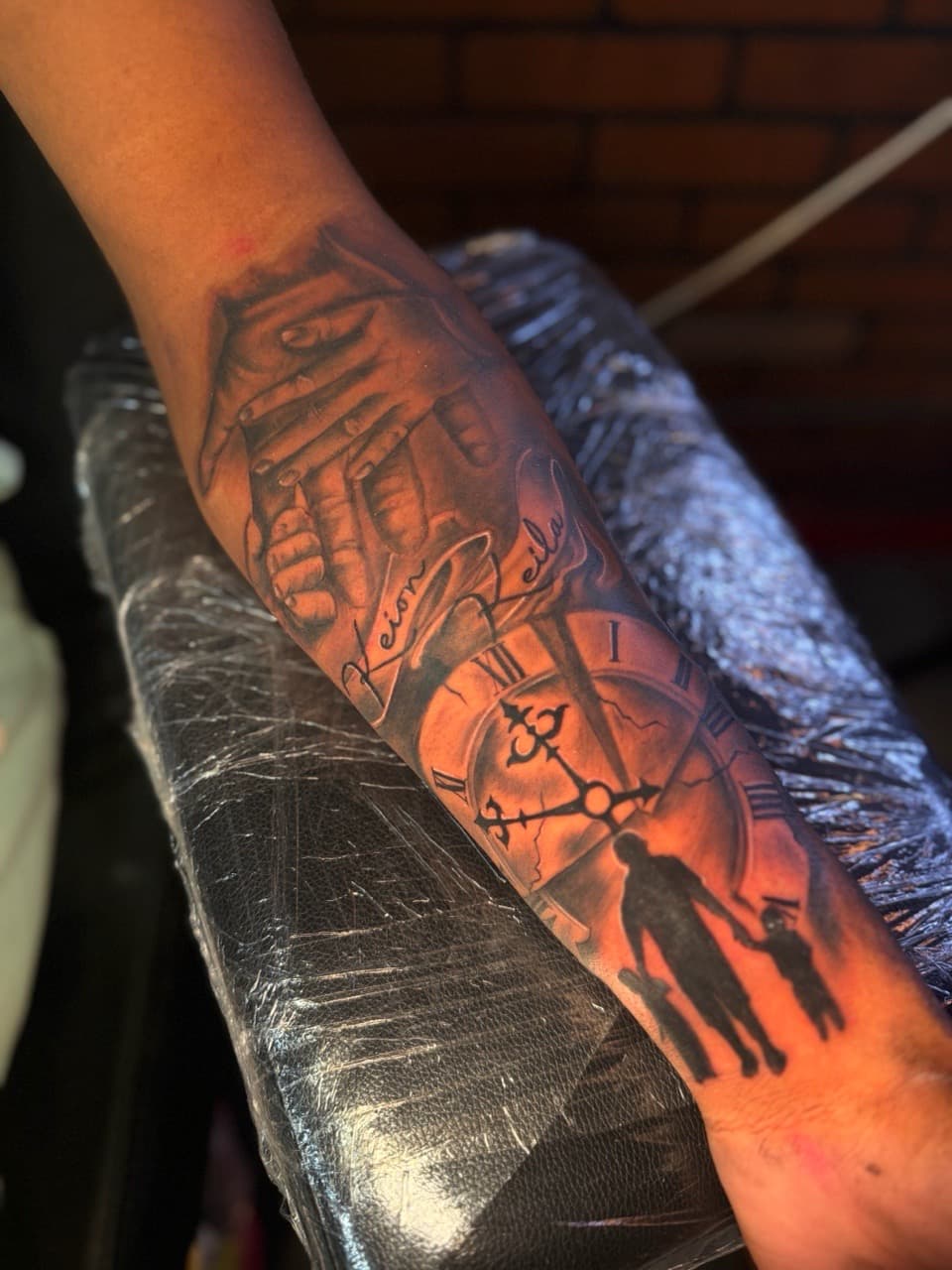 Black & Grey + Realism hands tattoo on Forearm by InkdByHendrixx on TattMe
