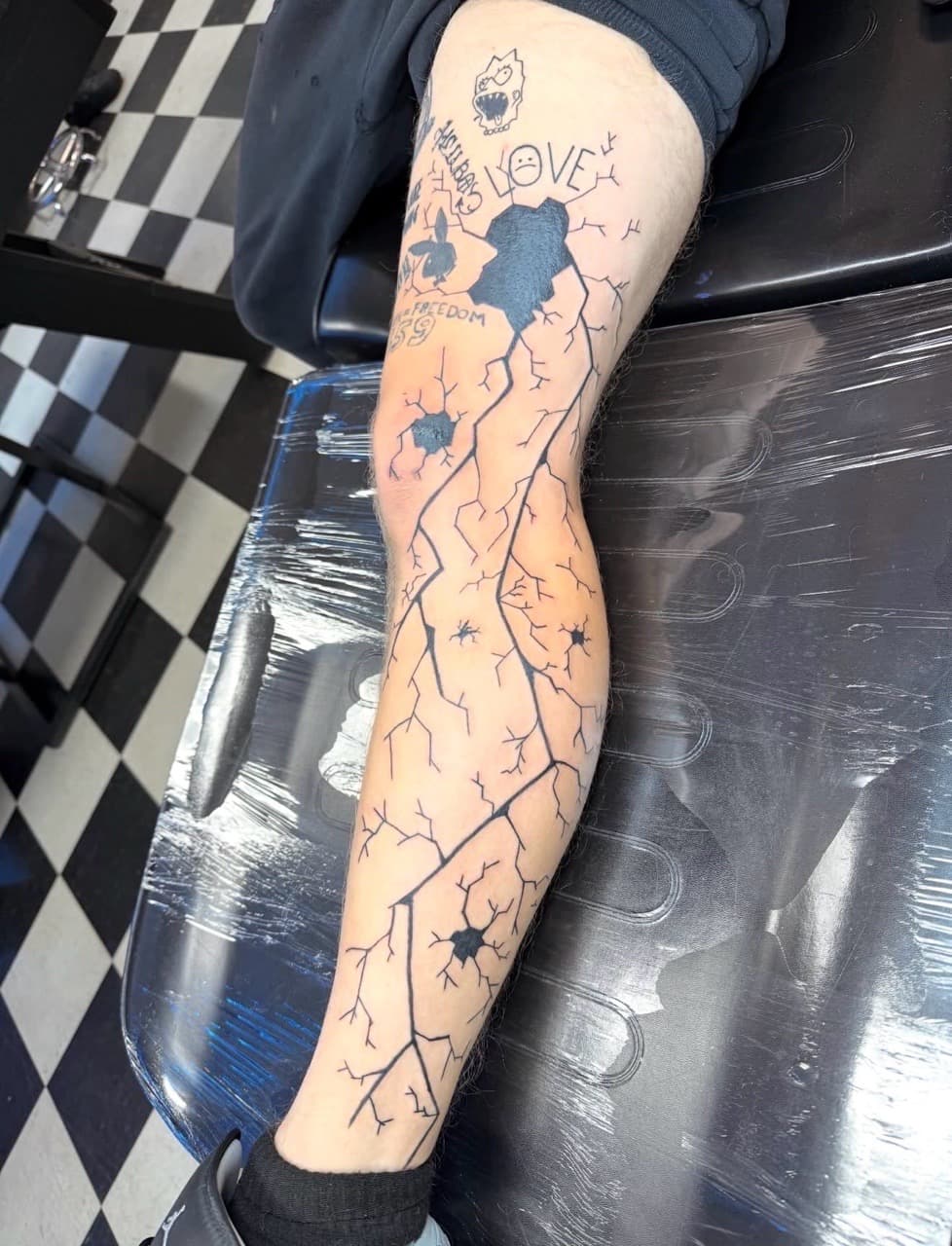 Black-work + Line-work cracks tattoo on Full Leg Sleeve by Lex on TattMe