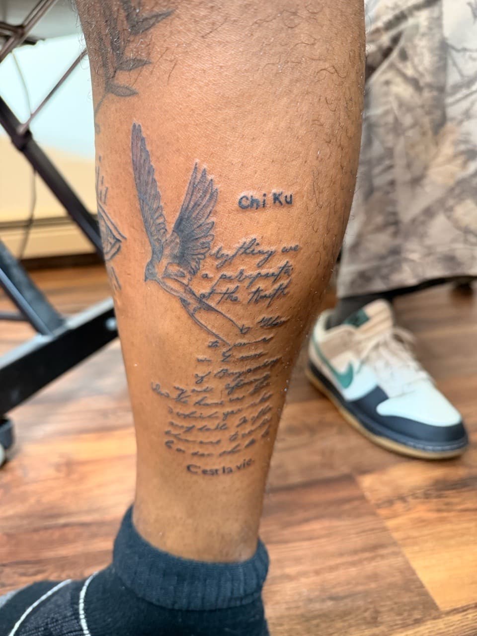 Black & Grey + Lettering bird tattoo on Calf by Lex on TattMe