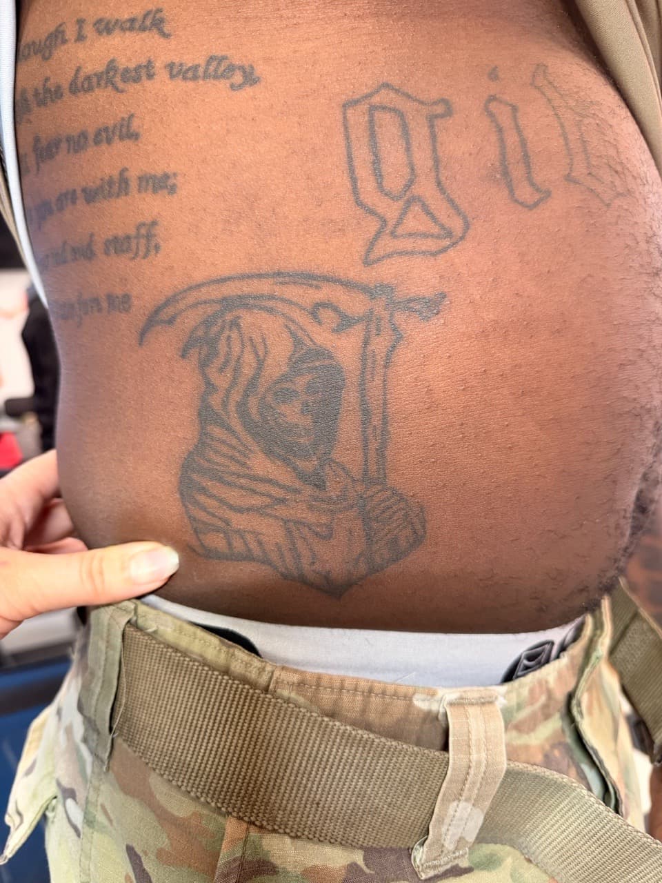 Black & Grey + Lettering grim reaper tattoo on Ribs by Lex on TattMe