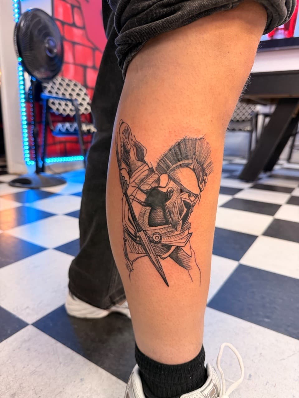 Line-work + Black & Grey spartan tattoo on Calf by Lex on TattMe