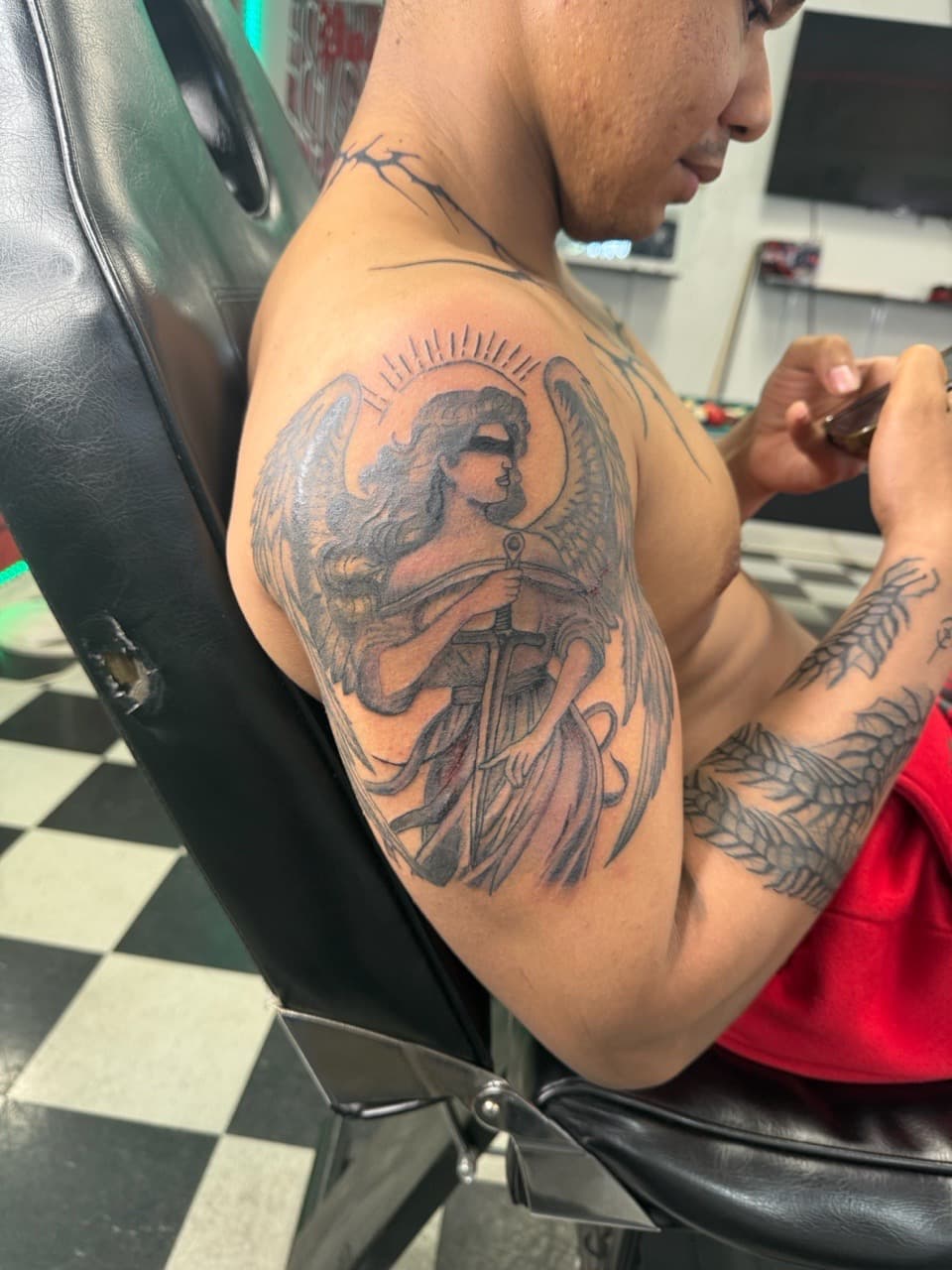 Black & Grey + Illustrative angel tattoo on Upper Arm by Lex on TattMe