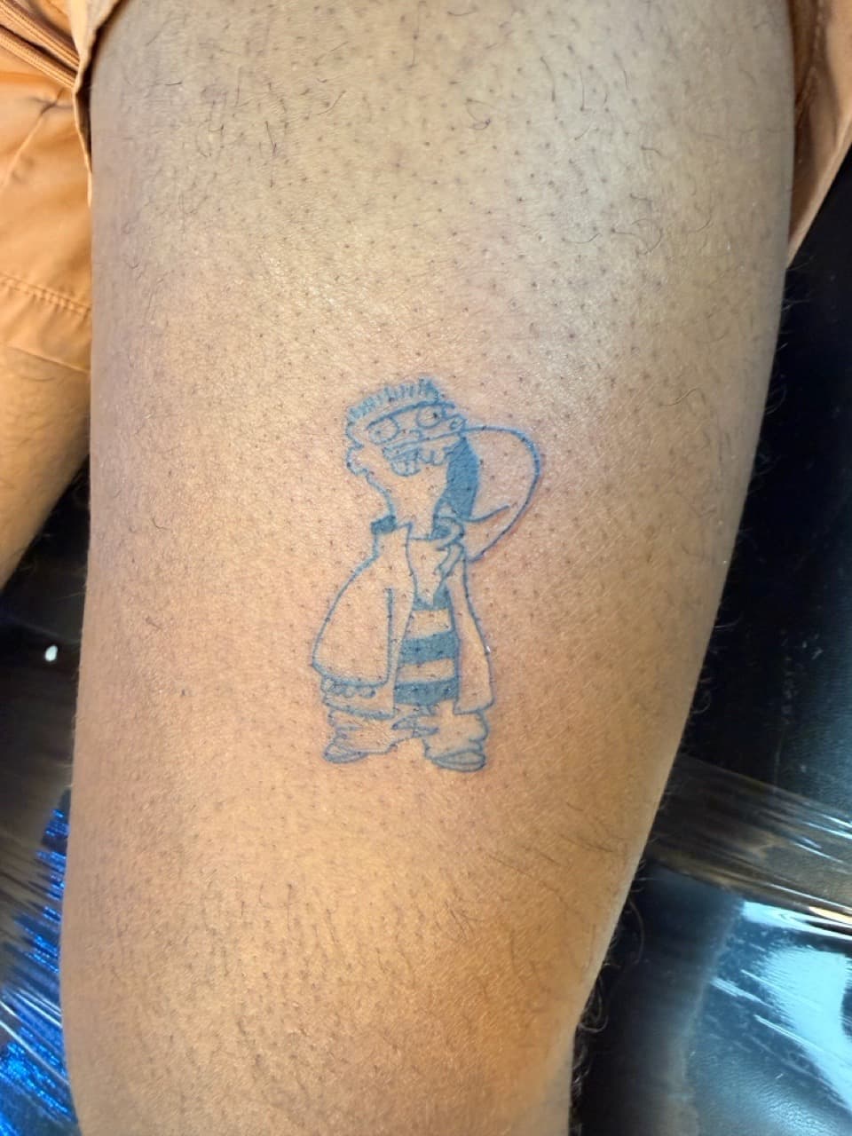 Cartoon + Line-work man tattoo on Thigh by Lex on TattMe