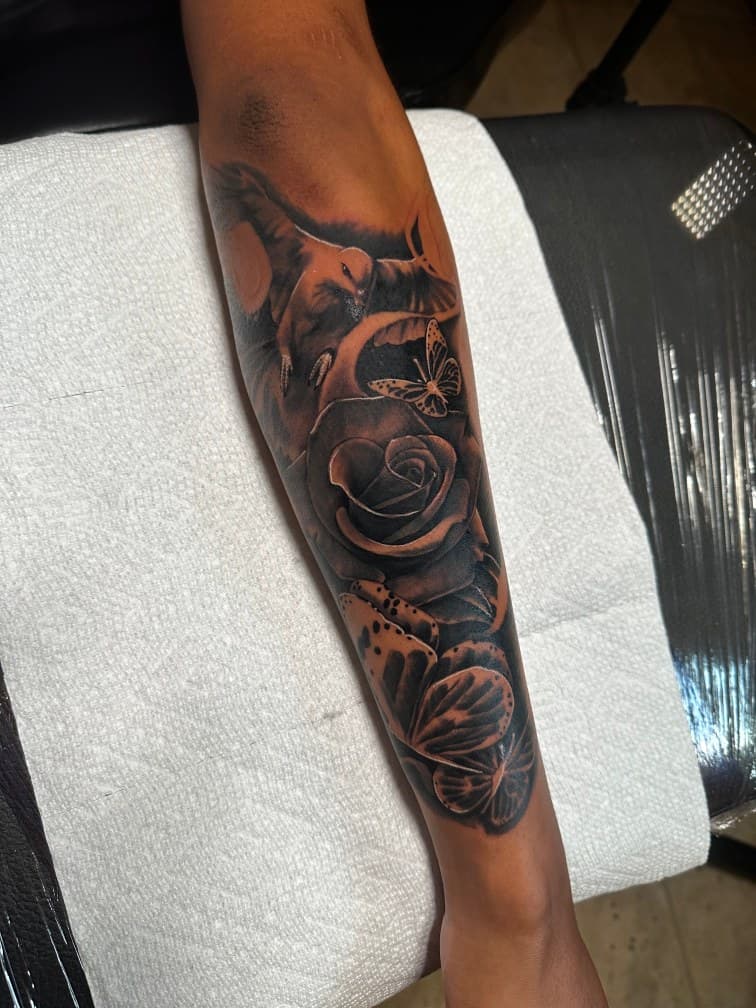 Black & Grey + Floral dove tattoo on Forearm by Trevion on TattMe