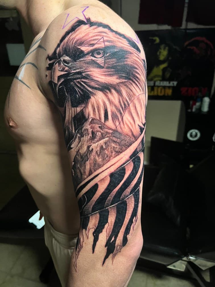 Realism + Black & Grey eagle tattoo on Half Sleeve by Trevion on TattMe