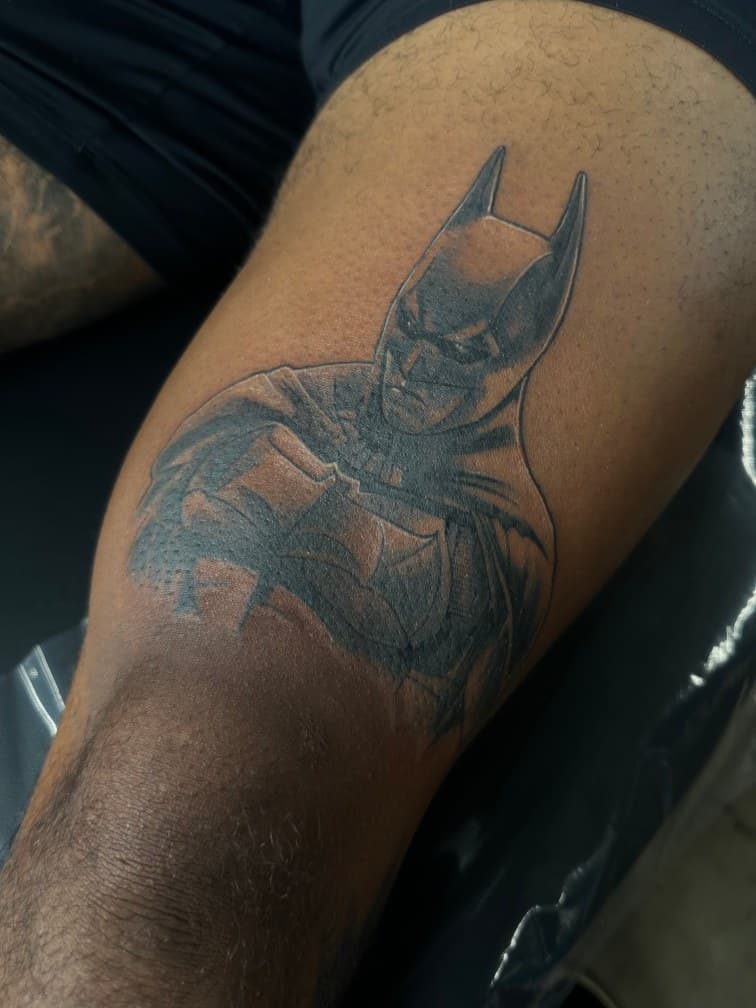 Black & Grey + Pop Culture batman tattoo on Thigh by Trevion on TattMe