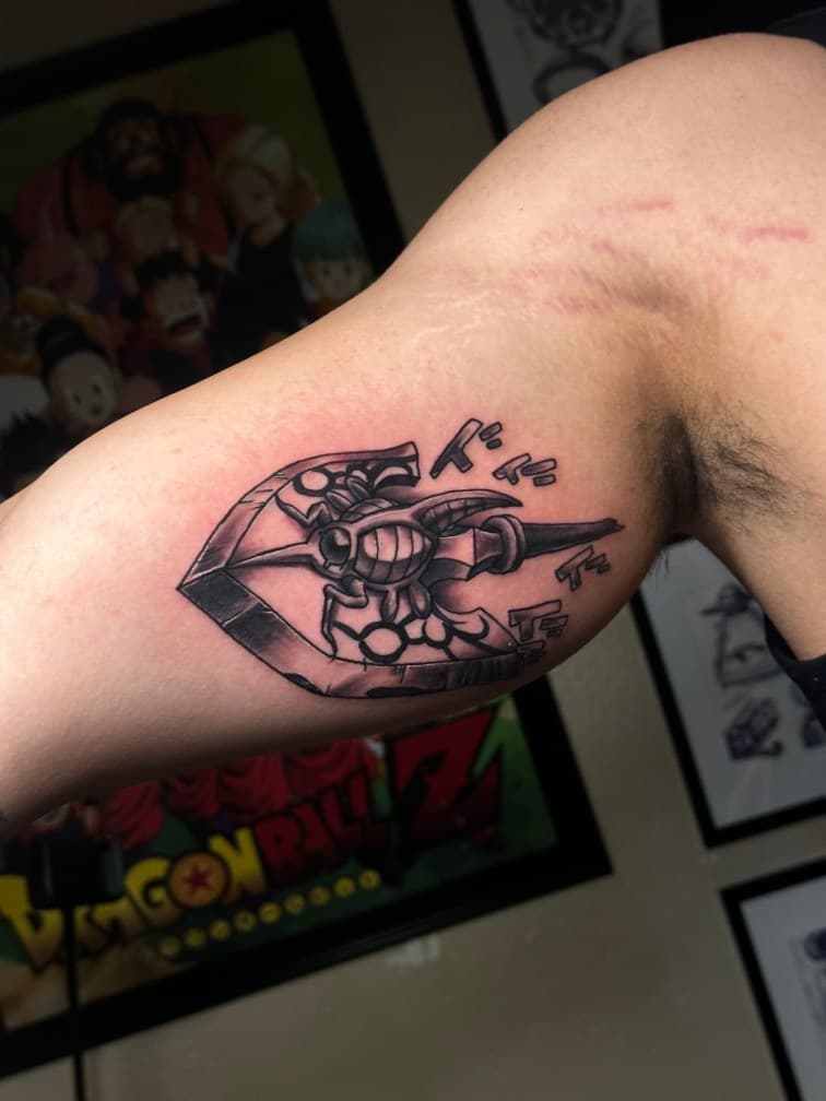 Black & Grey + Anime spaceship tattoo on Upper Arm by Trevion on TattMe