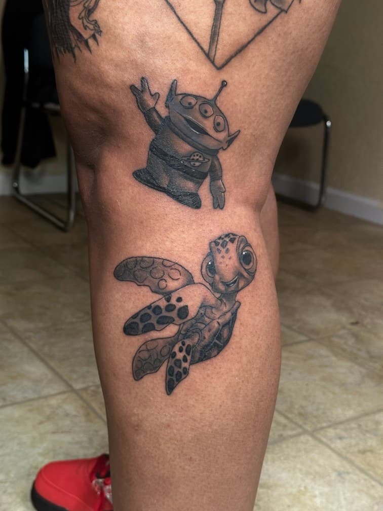 Black & Grey + Cartoon alien tattoo on Thigh by Trevion on TattMe