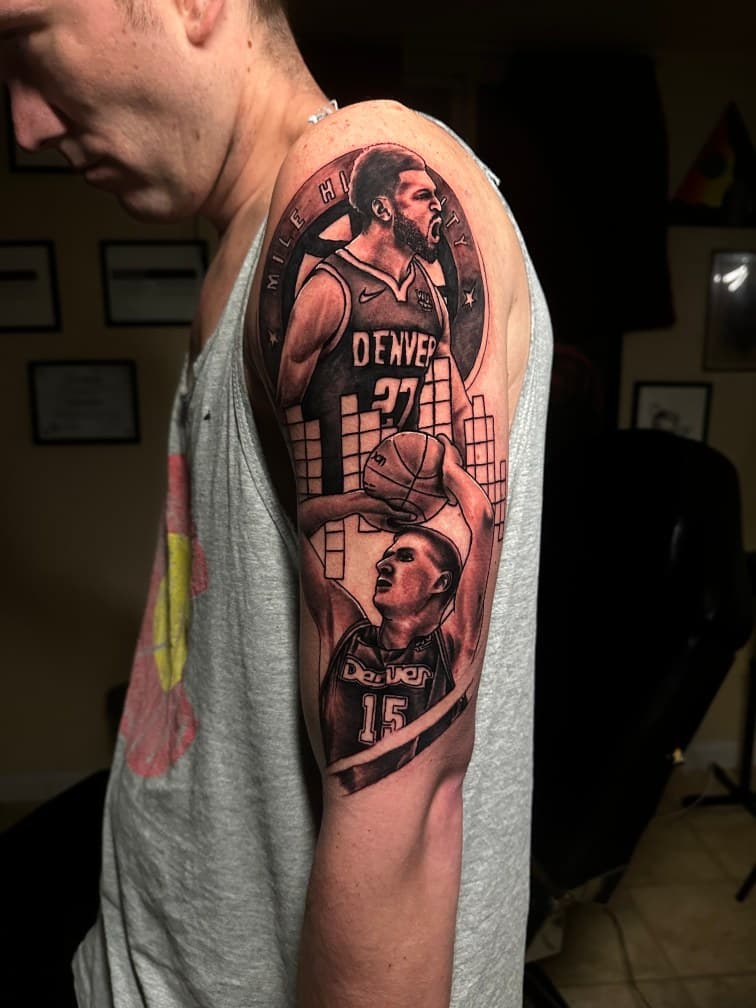 Black & Grey + Realism basketball players tattoo on Upper Arm by Trevion on TattMe