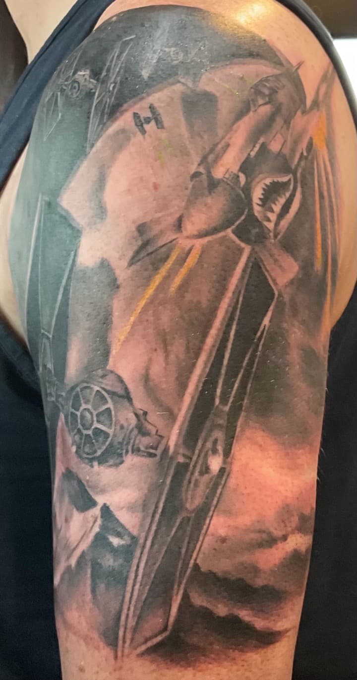 Black & Grey + Realism tie fighter tattoo on Upper Arm by Tattoos_By_Kev_TBK on TattMe
