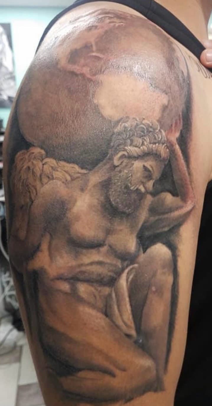 Realism + Black & Grey atlas tattoo on Upper Arm by Tattoos_By_Kev_TBK on TattMe